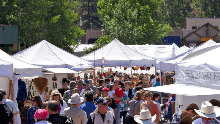 Aerial view of people walking the booths at the Estes Labor Day Arts & Craft Festival
